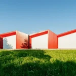 Aranchii Architects Designs a Modular Logistics Hub with Red Sculptural Roofs