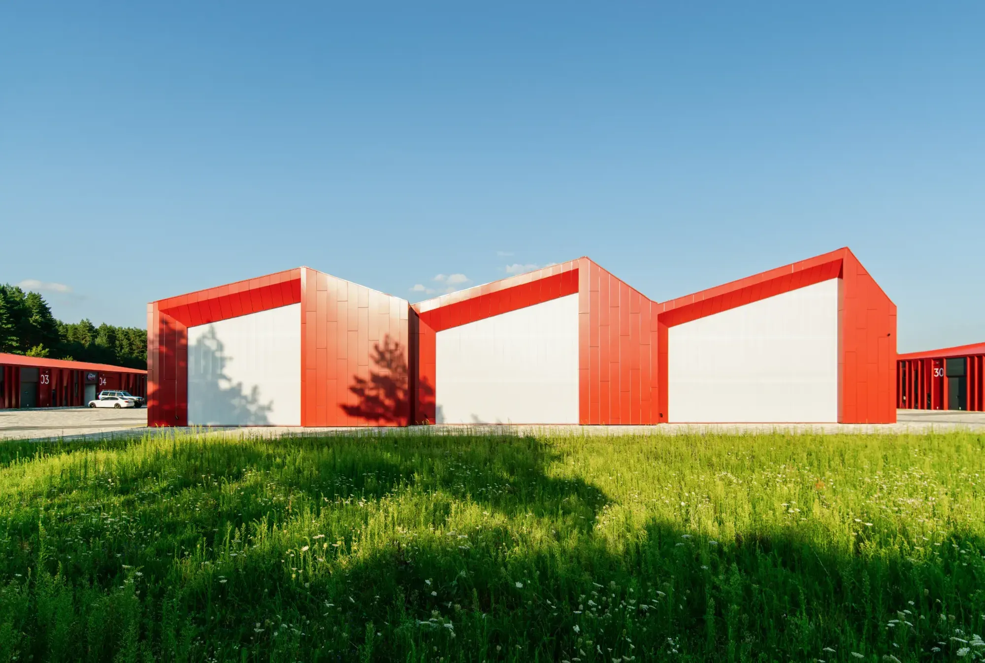 Aranchii Architects Designs a Modular Logistics Hub with Red Sculptural Roofs 5 Aranchii Architects Designs a Modular Logistics Hub with Red Sculptural Roofs