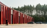 Aranchii Architects Designs a Modular Logistics Hub with Red Sculptural Roofs