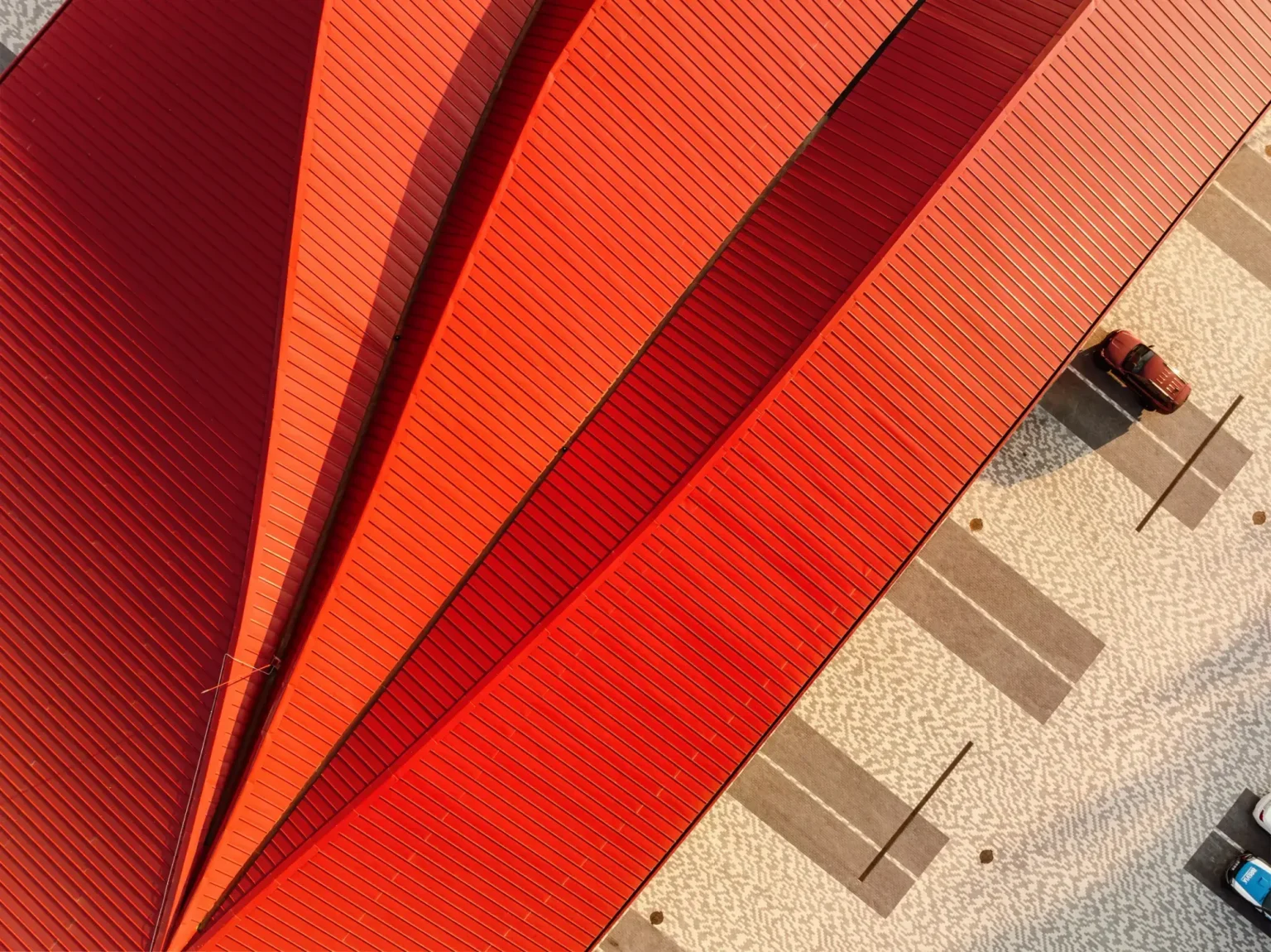 Aranchii Architects Designs a Modular Logistics Hub with Red Sculptural Roofs