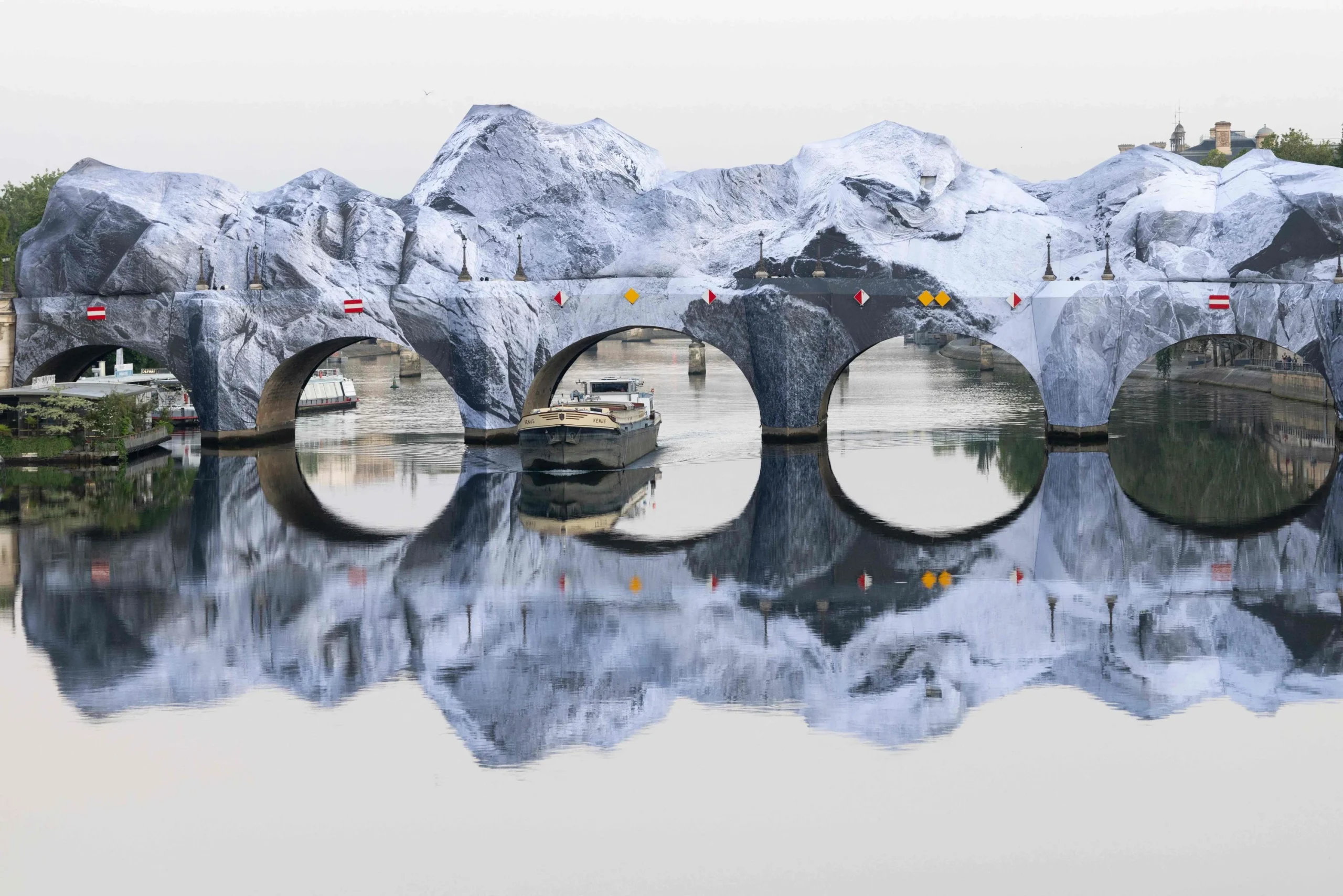 Street Artist JR Transforms Paris’ Pont Neuf Into Monumental Inflatable Cave