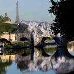 Street Artist JR Transforms Paris’ Pont Neuf Into Monumental Inflatable Cave