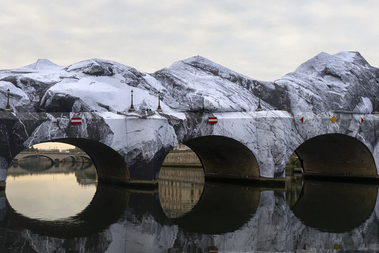 Street Artist JR Transforms Paris’ Pont Neuf Into Monumental Inflatable Cave