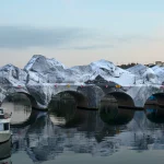 Street Artist JR Transforms Paris’ Pont Neuf Into Monumental Inflatable Cave