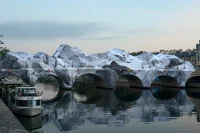 Street Artist JR Transforms Paris’ Pont Neuf Into Monumental Inflatable Cave