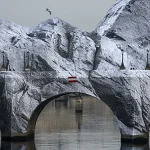 Street Artist JR Transforms Paris’ Pont Neuf Into Monumental Inflatable Cave