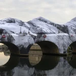 Street Artist JR Transforms Paris’ Pont Neuf Into Monumental Inflatable Cave