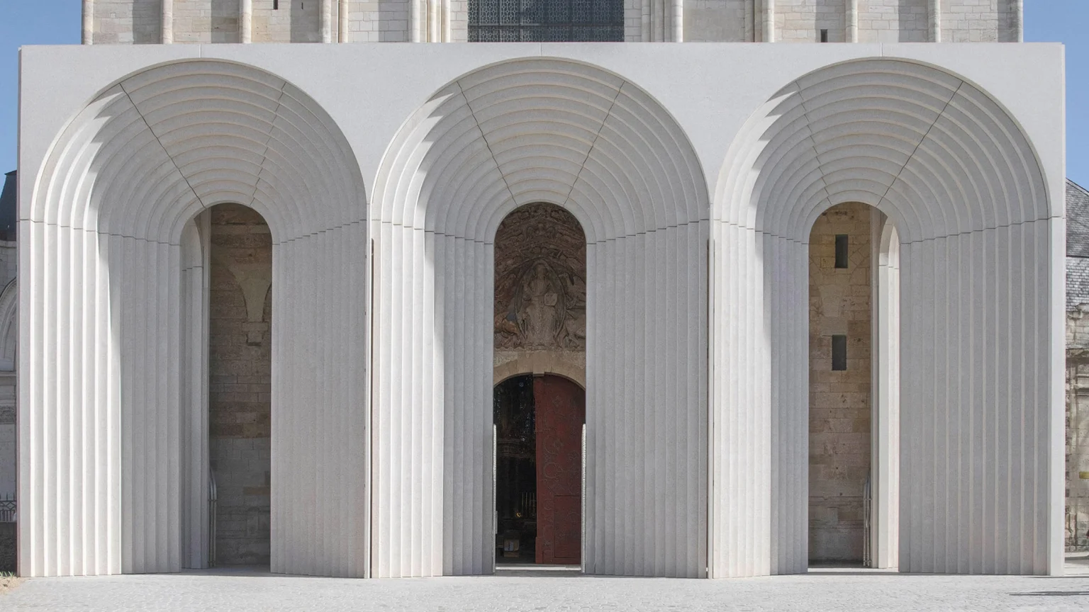 Kengo Kuma Reimagines a Gothic Cathedral Entrance in France with Sculptural Arches