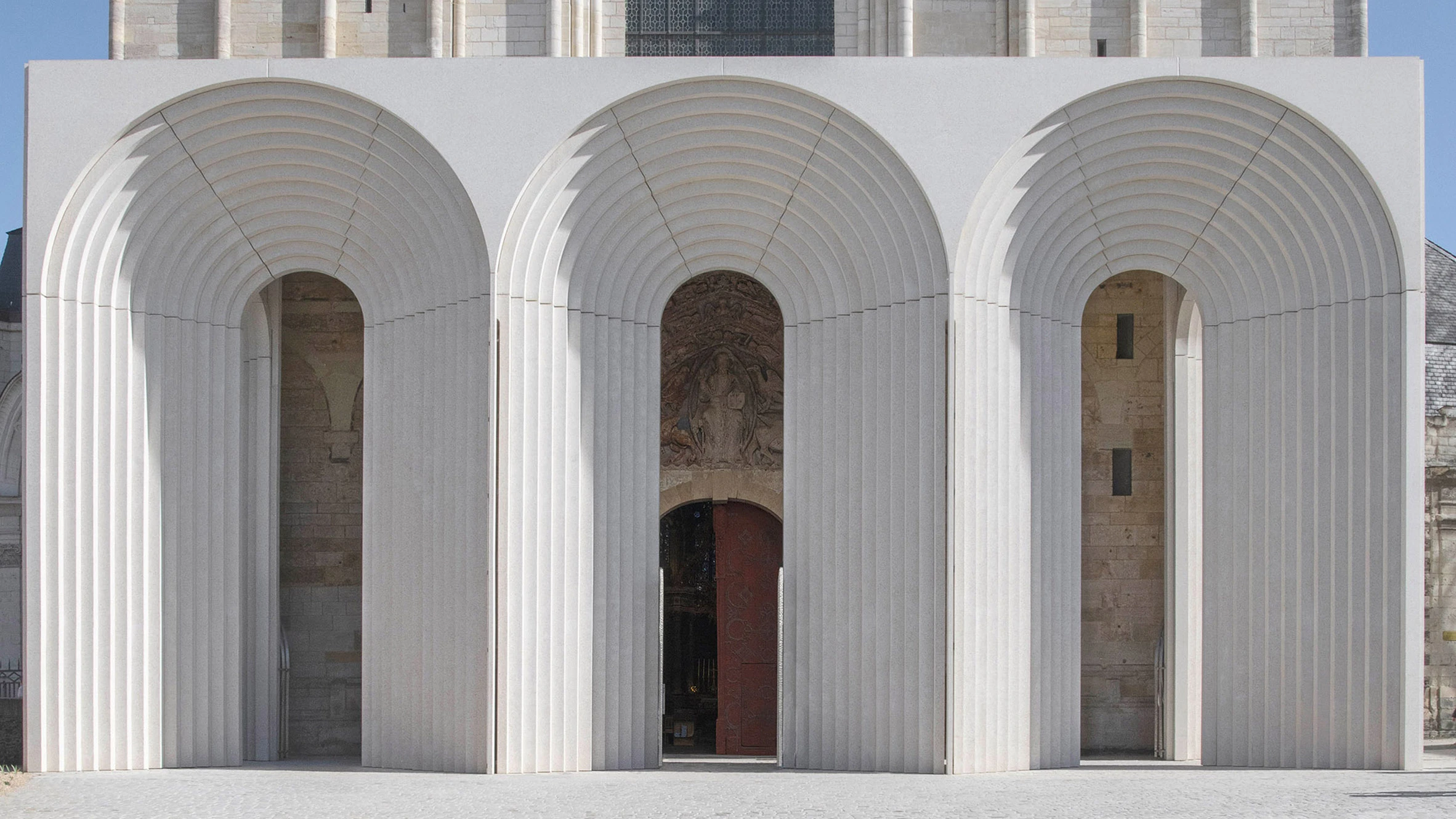 Kengo Kuma Reimagines a Gothic Cathedral Entrance in France with Sculptural Arches