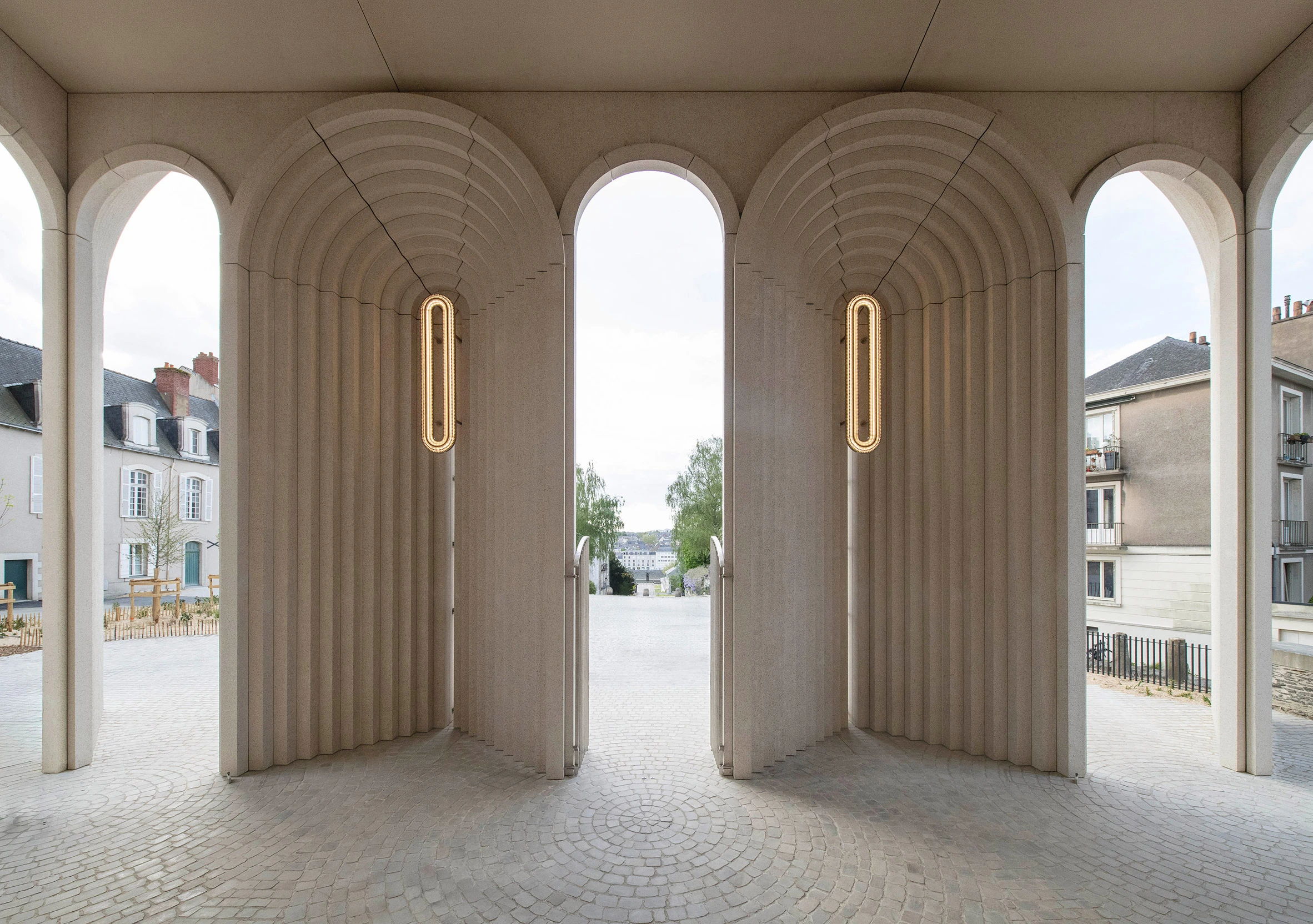 Kengo Kuma Reimagines a Gothic Cathedral Entrance in France with Sculptural Arches