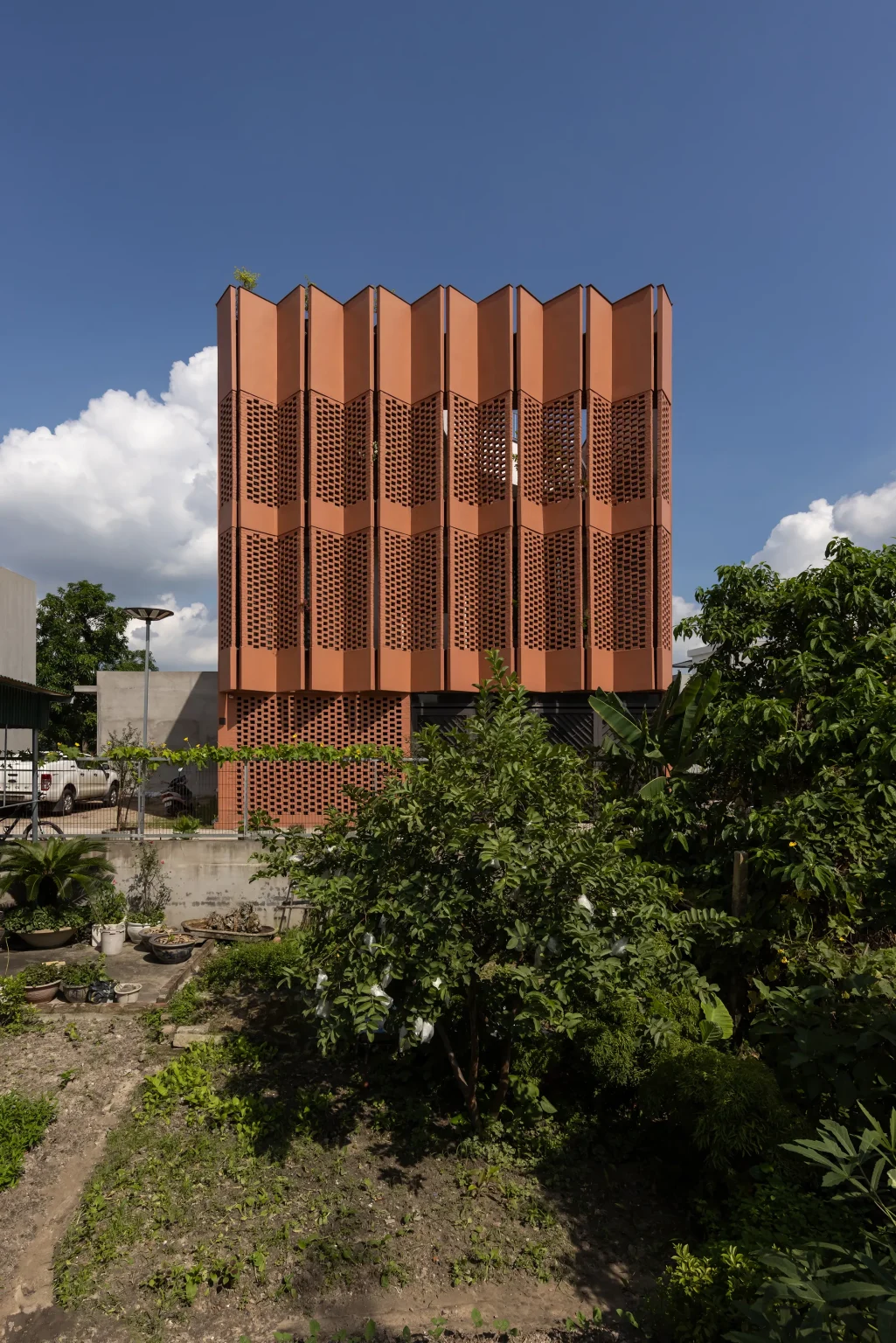 CUBE by H&P Architects Is a Climate-Responsive Brick Home Inspired by Vietnamese Tradition