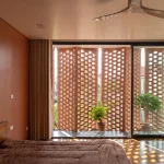 CUBE by H&P Architects Is a Climate-Responsive Brick Home Inspired by Vietnamese Tradition