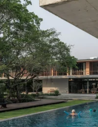 Twin Banyan Trees Define Anonym’s Baan Saikhoo Residence in Thailand