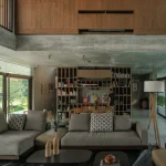 Twin Banyan Trees Define Anonym’s Baan Saikhoo Residence in Thailand