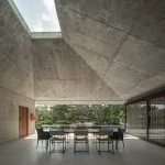 Twin Banyan Trees Define Anonym’s Baan Saikhoo Residence in Thailand