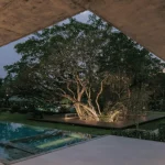 Twin Banyan Trees Define Anonym’s Baan Saikhoo Residence in Thailand