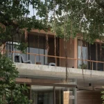 Twin Banyan Trees Define Anonym’s Baan Saikhoo Residence in Thailand