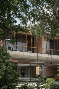 Twin Banyan Trees Define Anonym’s Baan Saikhoo Residence in Thailand