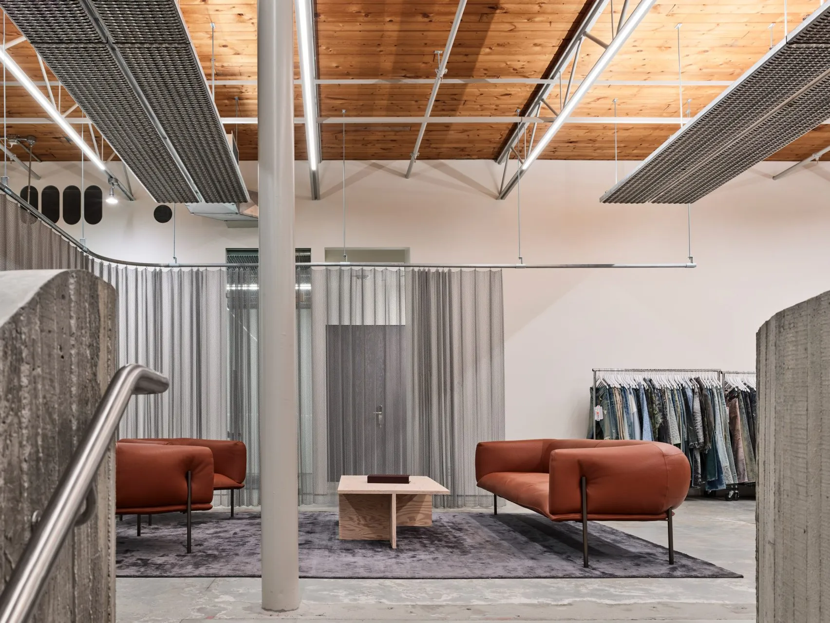 Purple Brand Studios by Scott & Scott Architects Blend Industrial Heritage with Raw Concrete Interventions