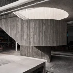 Purple Brand Studios by Scott & Scott Architects Blend Industrial Heritage with Raw Concrete Interventions