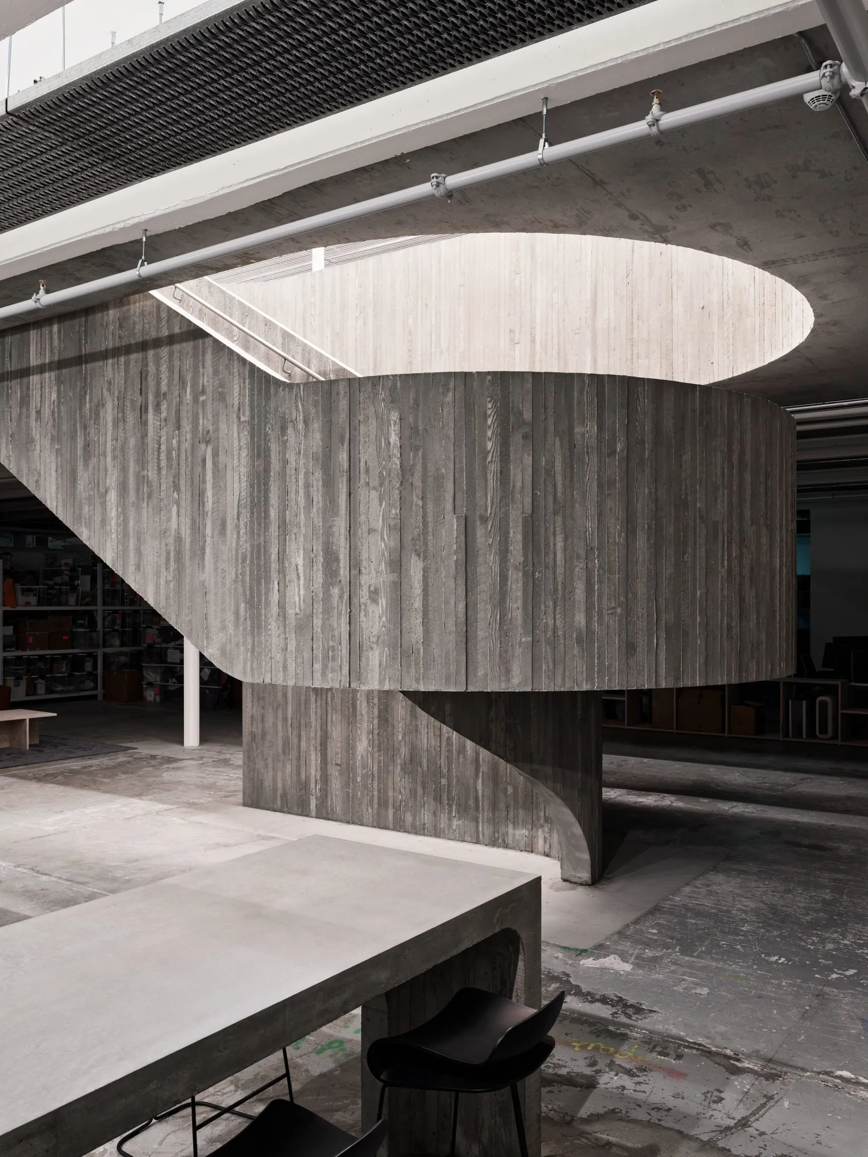 Purple Brand Studios by Scott & Scott Architects Blend Industrial Heritage with Raw Concrete Interventions