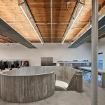 Purple Brand Studios by Scott & Scott Architects Blend Industrial Heritage with Raw Concrete Interventions