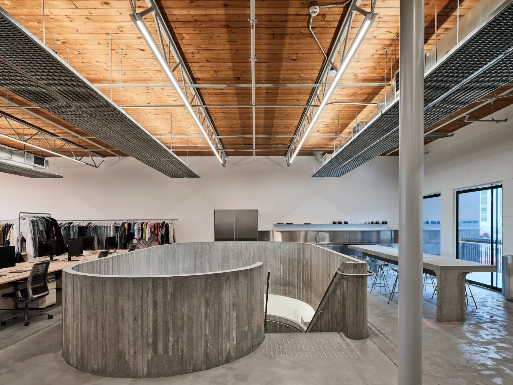 Purple Brand Studios by Scott & Scott Architects Blend Industrial Heritage with Raw Concrete Interventions