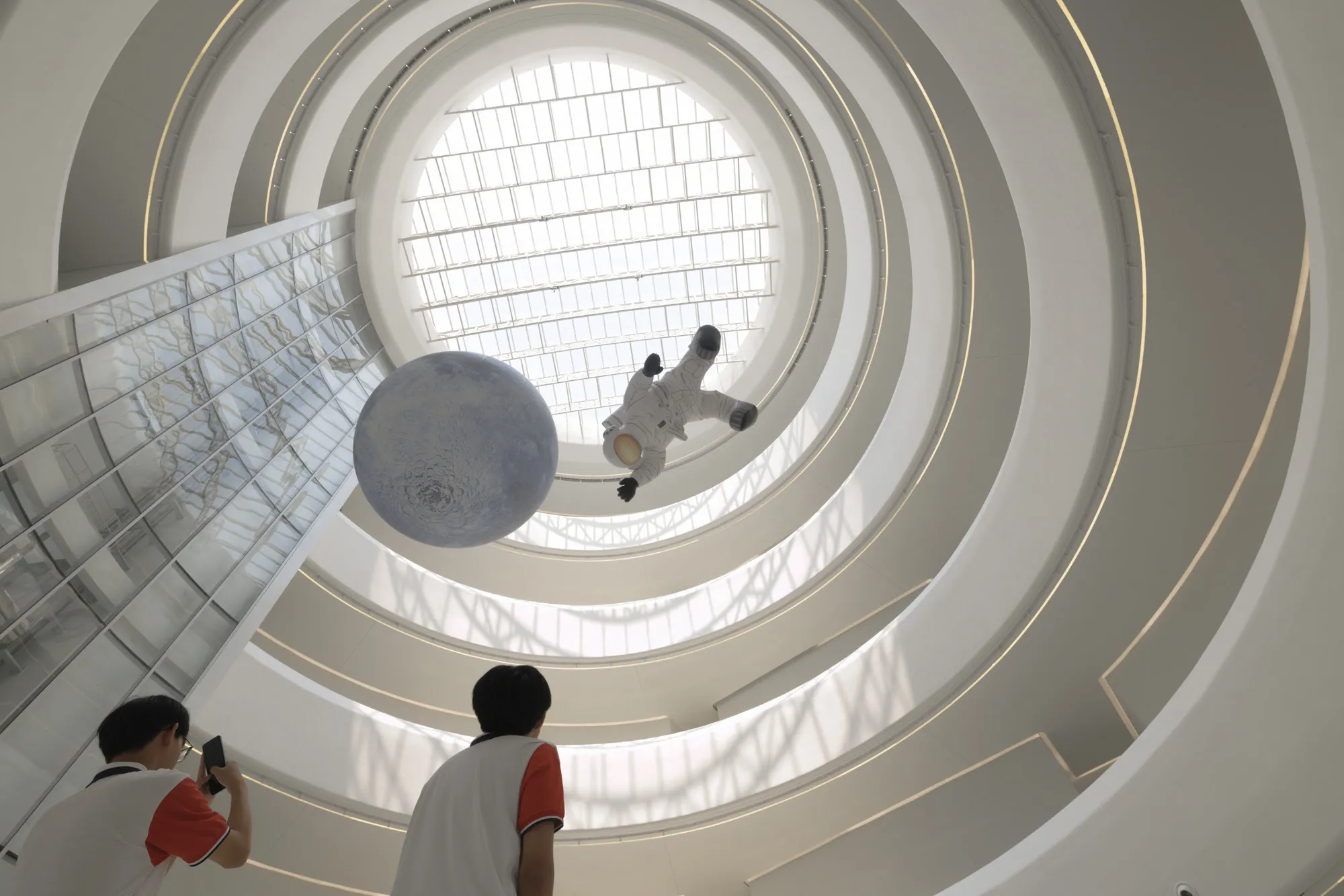 Hainan Science Museum in Haikou Creates a Floating Spiral World of Science and Nature