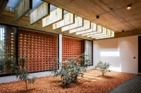 LIJO.RENY.architects Design a Brick-Wrapped Retreat House in Kerela