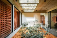 LIJO.RENY.architects Design a Brick-Wrapped Retreat House in Kerela
