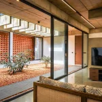 LIJO.RENY.architects Design a Brick-Wrapped Retreat House in Kerela