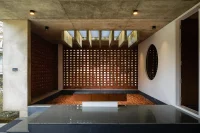LIJO.RENY.architects Design a Brick-Wrapped Retreat House in Kerela