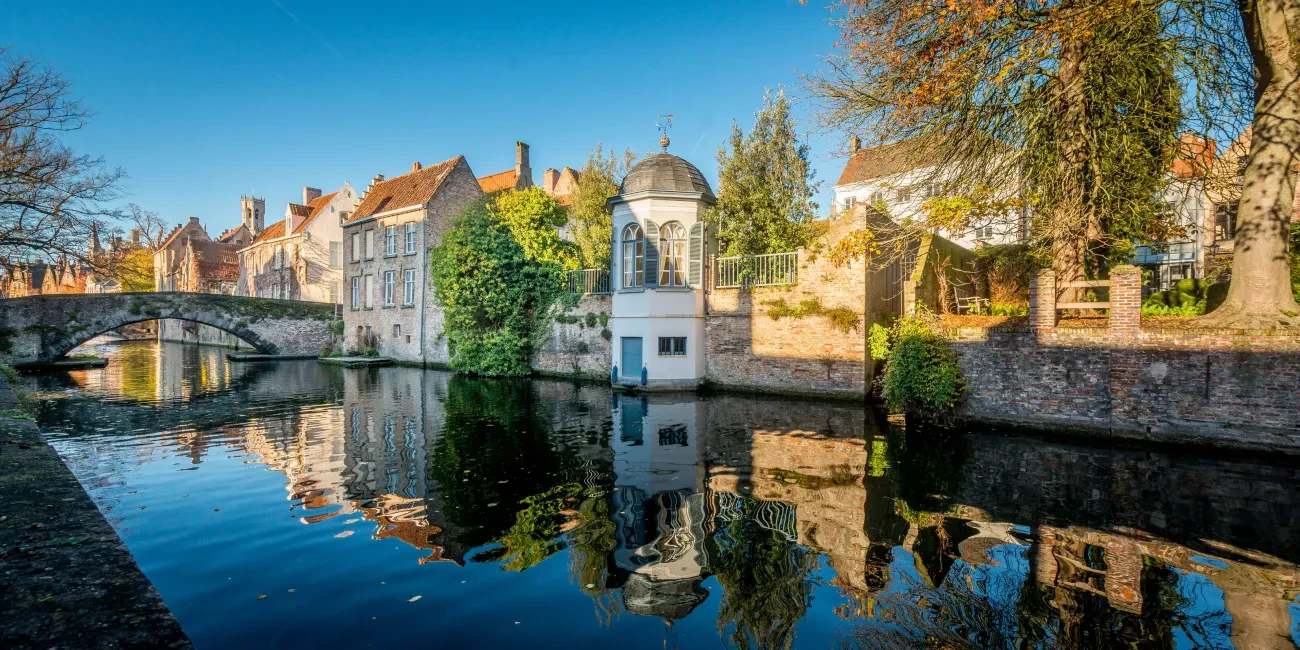15 Picturesque Neighborhoods Around the World Every Design Lover Should Visit 15 Groenerei Canal District, Bruges, Belgium