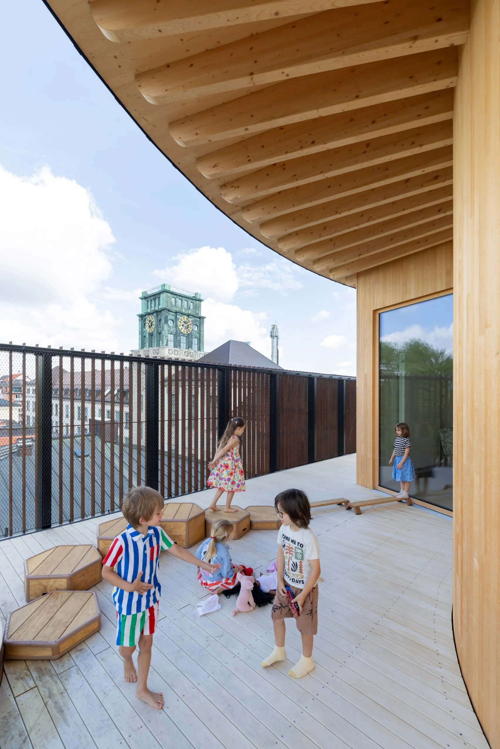 Kéré Architecture Designs a Vertical Timber Kindergarten Built Around Play, Community, and Care 7 Kéré Architecture Designs a Five-Storey Timber Kindergarten at TUM Built Around Play, Community and Care