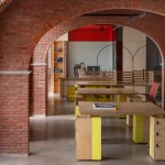 Logic Design + Build Reinvents an Office with Brick Arches and Mondrian-Inspired Interiors