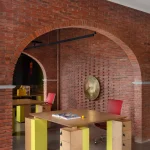 Logic Design + Build Reinvents an Office with Brick Arches and Mondrian-Inspired Interiors