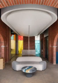 Logic Design + Build Reinvents an Office with Brick Arches and Mondrian-Inspired Interiors