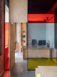 Logic Design + Build Reinvents an Office with Brick Arches and Mondrian-Inspired Interiors