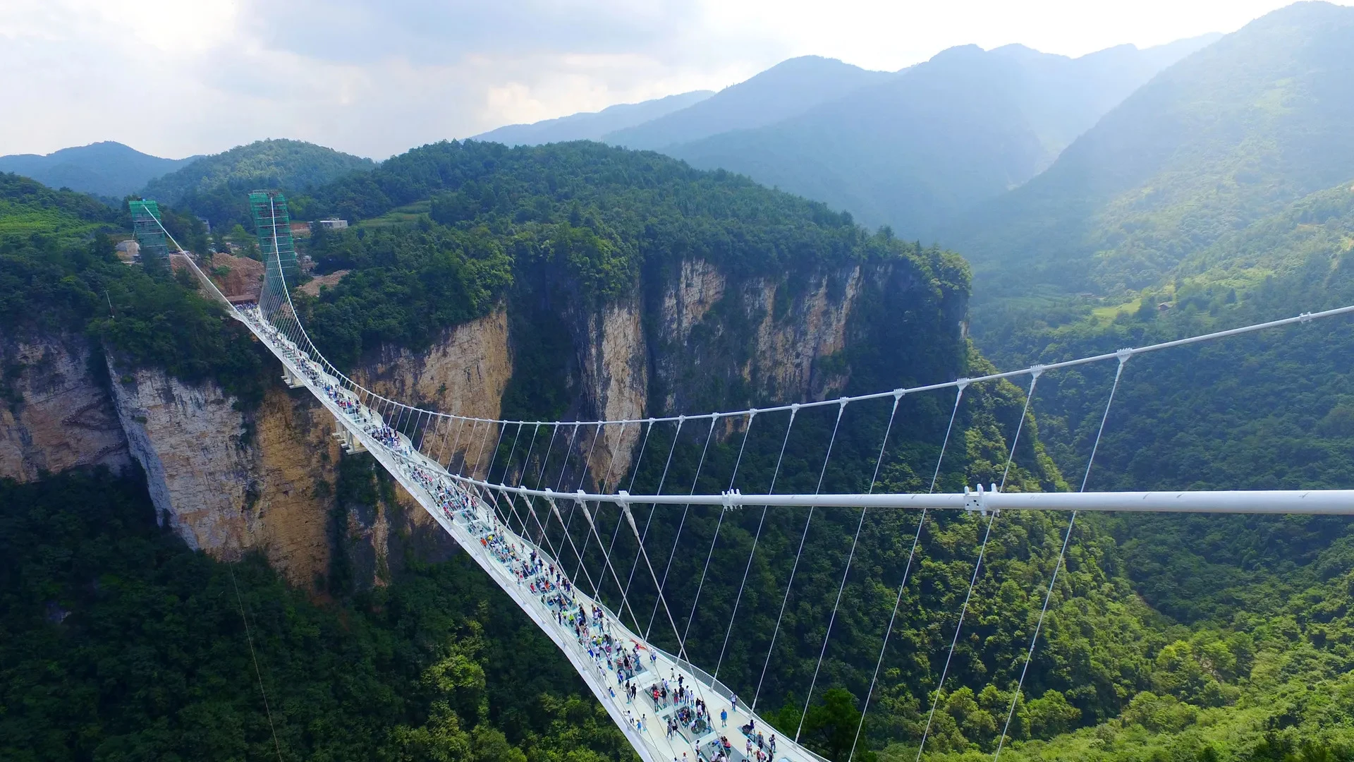 8 Breathtaking Glass Bridges That Feel Like Walking on Air 5 Glass Bridges