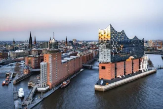 Explore how adaptive reuse can transform heritage buildings into sustainable urban assets while supporting conservation, housing, economic regeneration, climate goals, and social resilience.