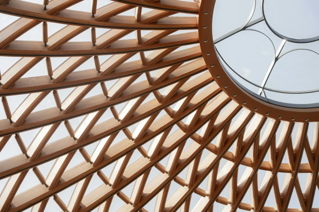 Curved timber beams forming the dome of The Seed pavilion