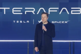 Tesla’s proposed TeraFab AI chip factory could deepen its vertical integration, reshaping semiconductor production, AI infrastructure, architecture, and the future of automated manufacturing.