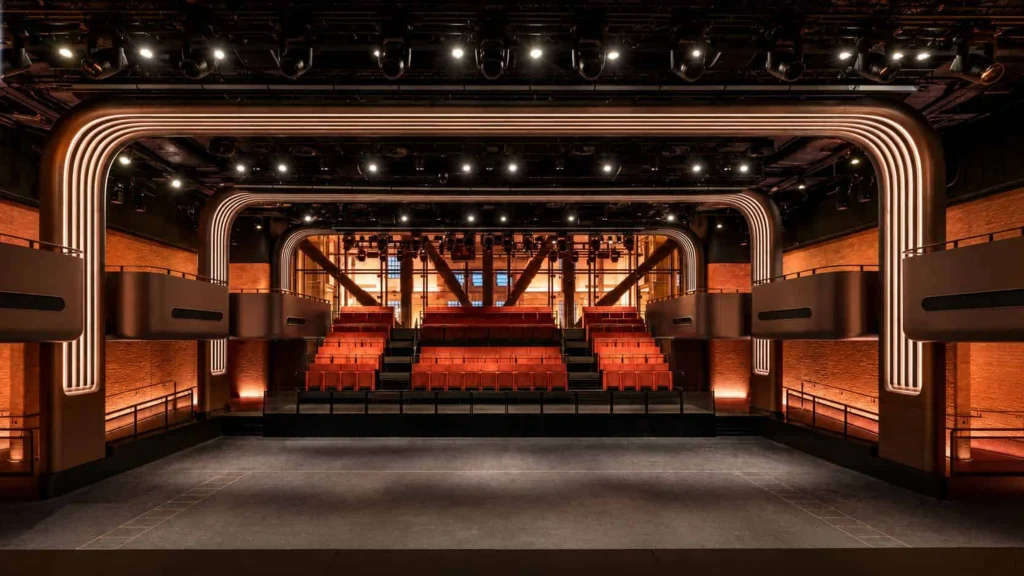 Stage view of Apple Music Hall showing the wide performance area and surrounding seating