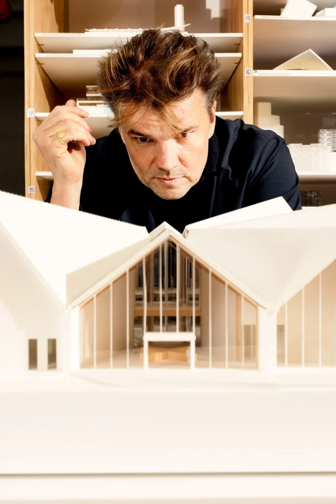 Can architecture really solve social problems? This critical essay examines Bjarke Ingels’ optimistic design philosophy, public architecture, sustainability, accessibility, and the limits of architectural agency.
