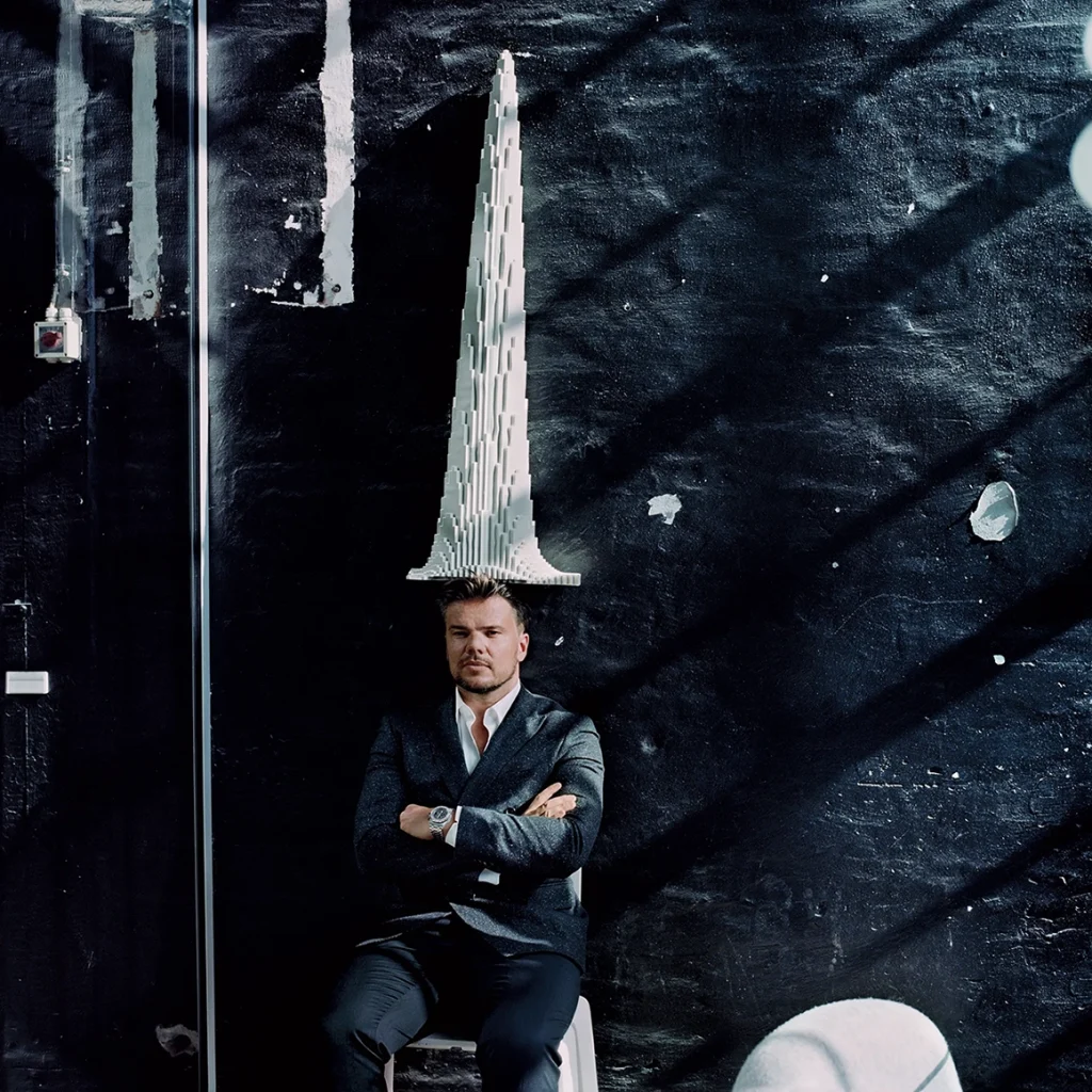 Can architecture really solve social problems? This critical essay examines Bjarke Ingels’ optimistic design philosophy, public architecture, sustainability, accessibility, and the limits of architectural agency.