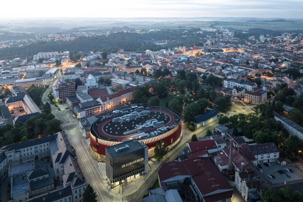 Aerial view of Jihlava showing the red arena embedded in the urban fabric