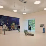 Interior gallery of the Wyss Museum with visitors viewing large artworks