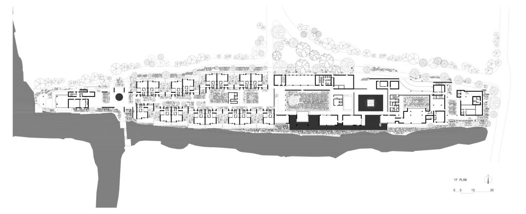 Architectural site plan showing the linear arrangement of courtyards, rooms and circulation