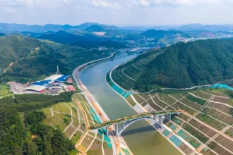 Aerial view of Longmen Bridge near the mouth of the Pinglu Canal in Qinzhou, Guangxi, August 25, 2026