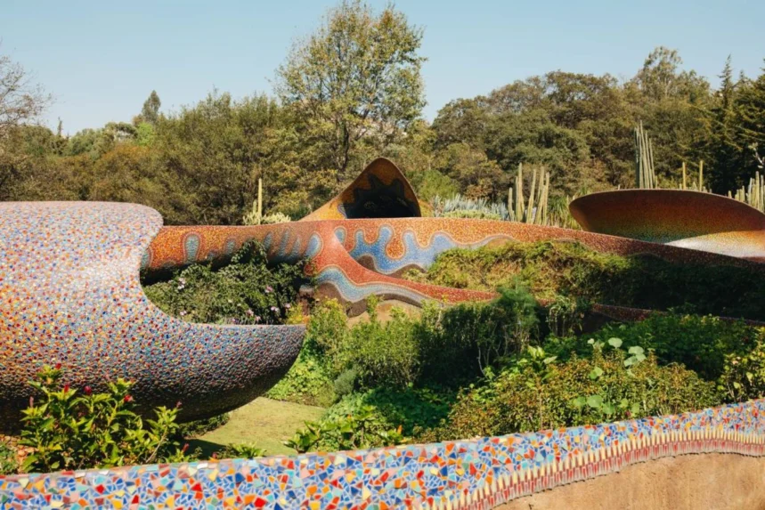 Elevated ferrocement walkway and tunnel structure set among trees at Quetzalcóatl Park Javier Senosiain